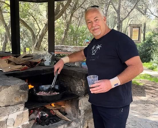 Chris Tunmore, who runs Outdoor Living Spain, cooking on an outdoor grill